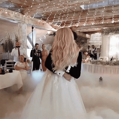 Bride And Groom Dancing In Front Of Crowd GIF
