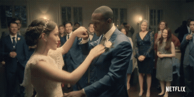 Bride And Groom Dancing With Netflix Logo GIF