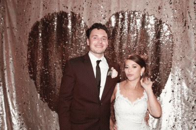 Bride And Groom Heart Shaped Sequined Backdrop GIF