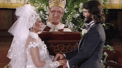 Bride And Groom Holding Hands In Front Of Priest Picture GIF