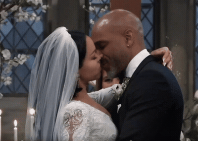 Bride And Groom Kiss At Church Wedding GIF