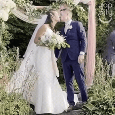 Bride And Groom Kissing GIF