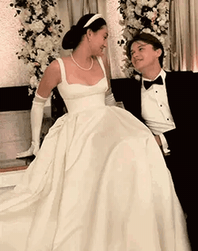 Bride And Groom Posing At Wedding GIF
