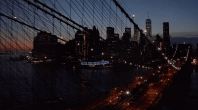 Bridge Over River With City GIF
