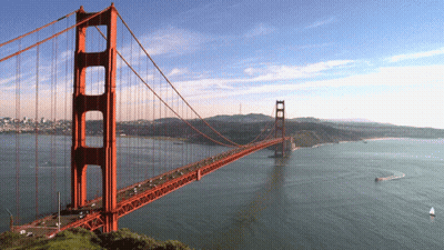 Bridge Over Water With Boat GIF