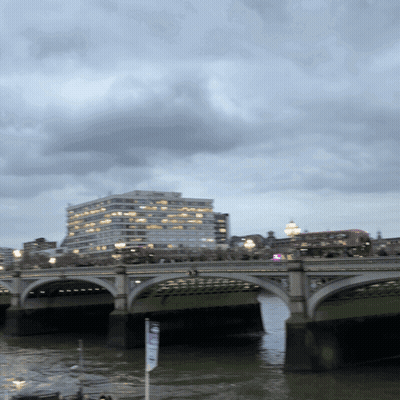 Bridge Over Water With Building and No Parking Sign
