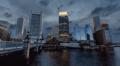 Bridge Over Water With Buildings GIF