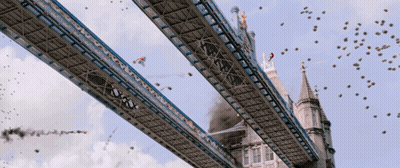 Bridge With Birds Flying Over Tower GIF