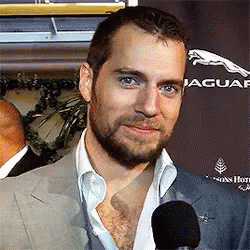 British Actor Henry Cavill Wink  GIF