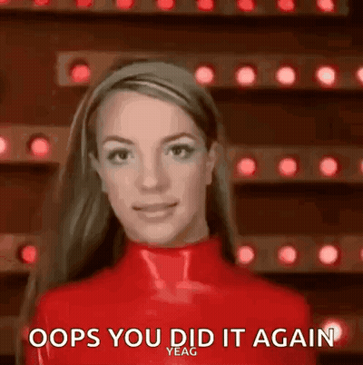 Britney Spears In Red Latex Outfit Smiling GIF