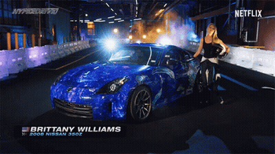 Brittany Williams Standing Next To Blue Nissan 380Z GIF