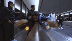 Bronny James Playful Escalator Swim GIF
