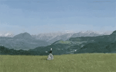 Brown Bear Tickling Bunny With Stick GIF