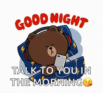 Brown Bear Wearing Headphones Lying In Bed GIF