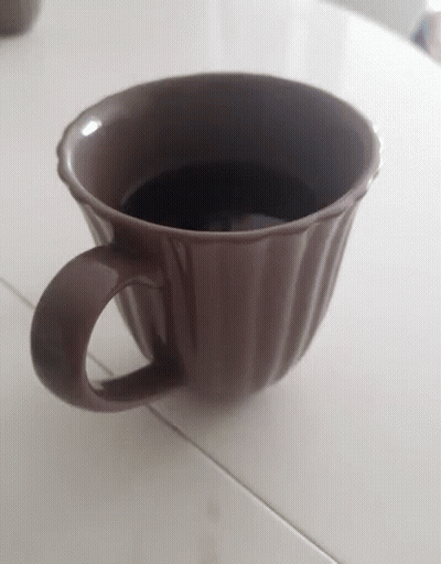 Brown Coffee Cup On Table GIF