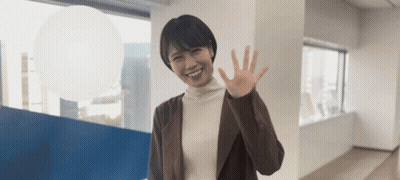 Brown Jacket Woman Smiling And Waving GIF