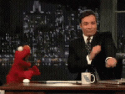 Brown Teddy Bear Holding Microphone GIF