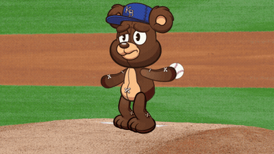Brown Teddy Bear In Blue KB Hat On Baseball Field GIF
