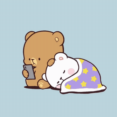 Brown Teddy Bear Looking At Cell Phone Next To White Teddy Bear Under Star Blanket GIF