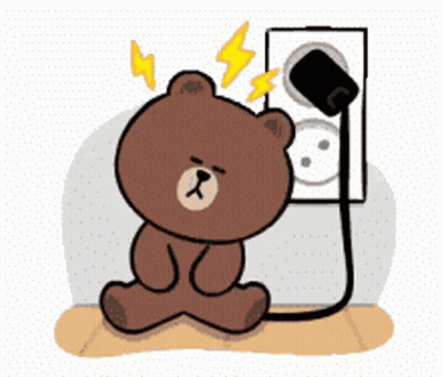 Brown Teddy Bear Sitting In Front Of Electrical Outlet With Lightning Bolts GIF