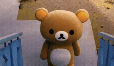 Brown Teddy Bear Standing On Steps GIF