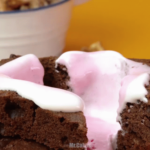 Brownie With Pink And White Frosting GIF