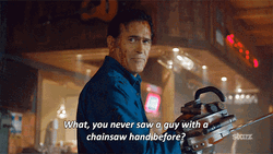 Bruce Campbell Evil Dead Chainsaw GIF