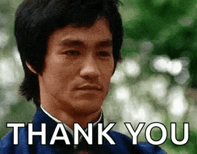Bruce Lee Giving Thank You Gesture GIF