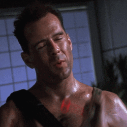 Bruce Willis Blowing GIF
