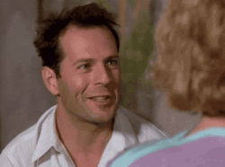 Bruce Willis Smiling At Woman