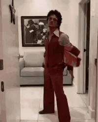 Bruno Mars Dropping Coat GIF