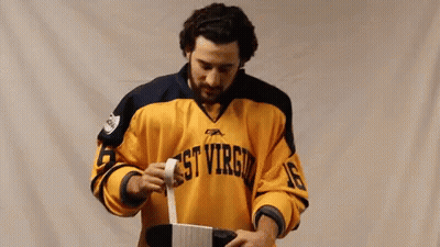 Bryson George Arms Crossed In Front Of Tech Logo GIF