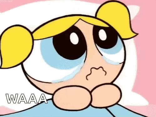 Bubbles From The Powerpuff Girls Is Crying While Sitting On A Bed . GIF