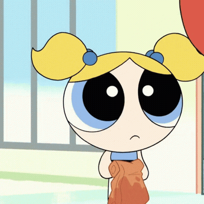 Bubbles From The Powerpuff Girls Is Holding A Brown Towel GIF