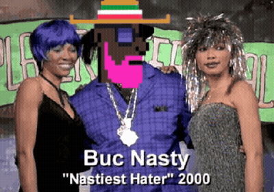 Buc Nasty Has A Hat On His Head And Is Standing With Two Women GIF