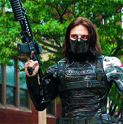 Bucky Walking With His Gun GIF