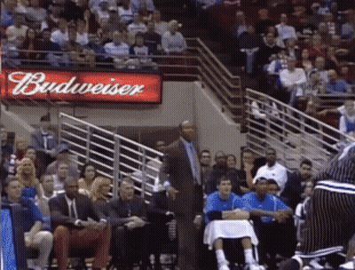 Budweiser Sign Above Crowd Watching Basketball GIF