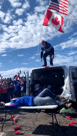 Buffalo Bills Fans Destroying Tables GIF