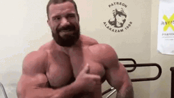 Buffed Guy Flexing Chest Muscle Growth GIF