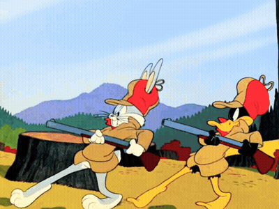 Bugs Bunny And Daffy Duck Holding Guns GIF