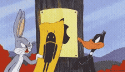 Bugs Bunny And Daffy Duck Standing Next To Android Sign GIF