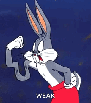 Bugs Bunny From Looney Tunes Is Flexing His Muscles And Says `` Weak '' . GIF