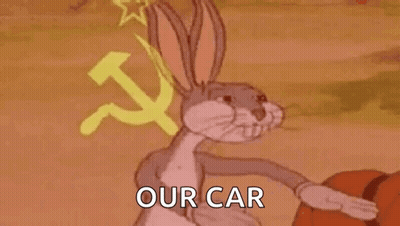 Bugs Bunny From Looney Tunes Is Holding A Basketball In Front Of A Hammer And Sickle Symbol . GIF
