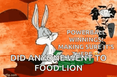 Bugs Bunny From Looney Tunes Is Sitting On A Table With A Bunch Of Money In His Hand . GIF