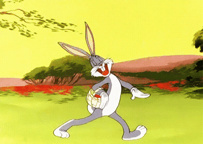 Bugs Bunny From The Looney Tunes Cartoon Is Holding An Easter Egg GIF