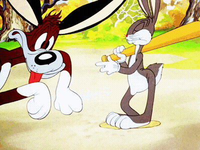 Bugs Bunny Holding Bat Pointing At Dog GIF
