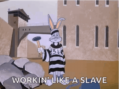 Bugs Bunny Holding Hammer In Jail Cell GIF