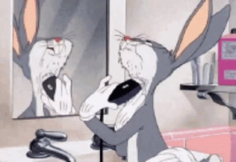Bugs Bunny Is Applying Makeup In Front Of A Bathroom Mirror GIF