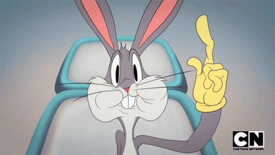 Bugs Bunny Is Giving A Thumbs Up With A Cartoon Network Logo Behind Him GIF