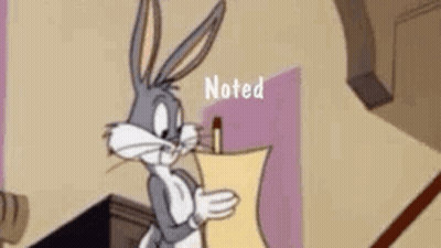 Bugs Bunny Is Holding A Piece Of Paper With A Pen In His Mouth . GIF